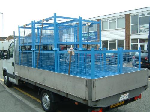 metal-cages-on-back-of-vehicle